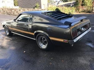 vintage mustang with yellow stripe