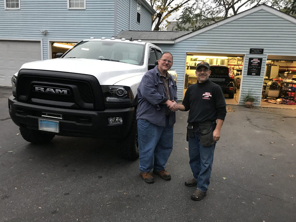 Joe difiore shaking hands with client